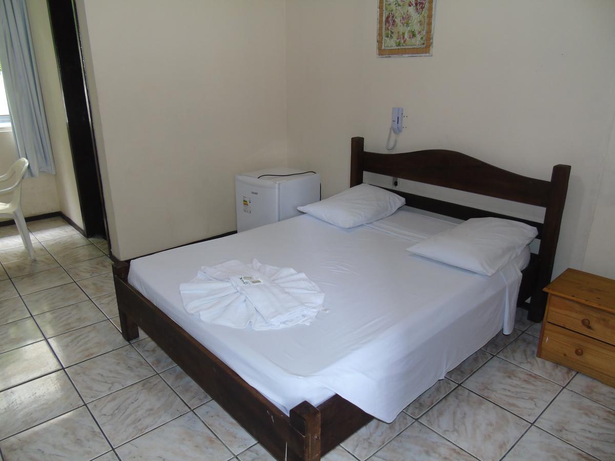 Quarto com Cama de Casal ou 2 de Solteiro e Banheiro Privativo