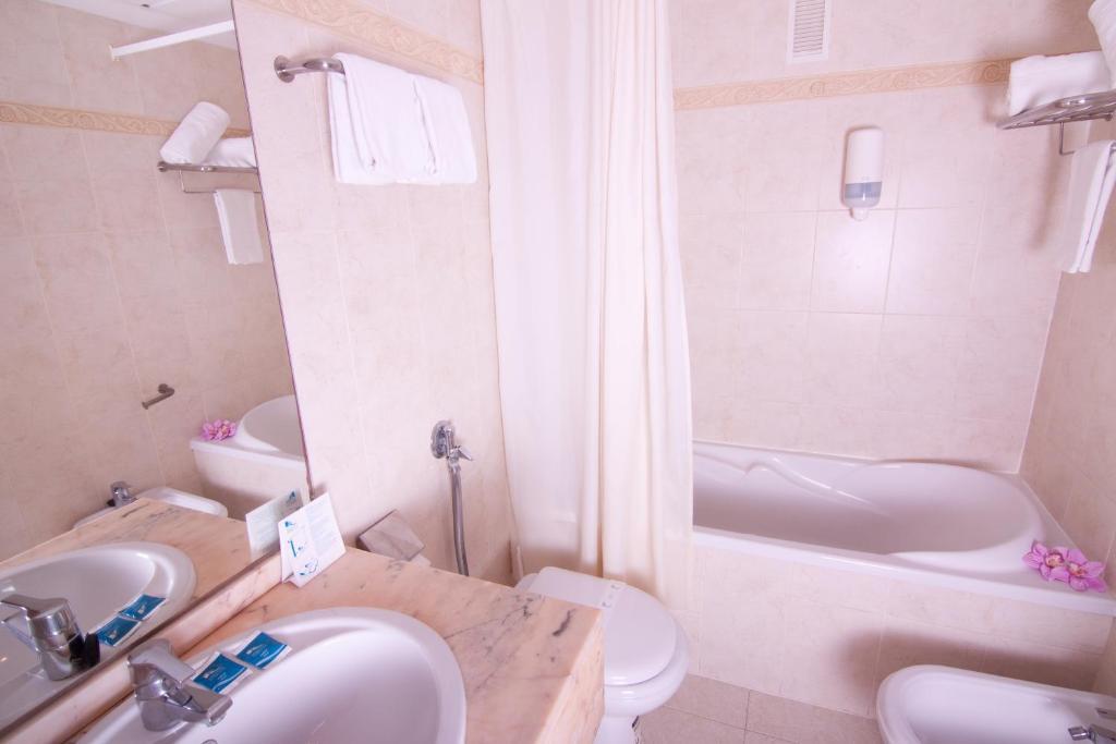 Family Room with Partial Sea View (3 Adults + 1 Child)