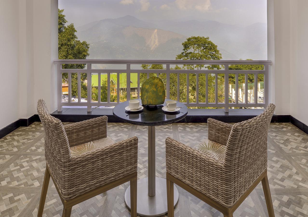 Deluxe Room Kanchenjunga View - 10% Discount on Foods & Soft Beverages* | 15% Discounts on Laundry Services* | INR 500 spa credit during your stay on selective Massage services. TnC Apply.* | Free Minibar - 2 cans of soft Beverages (Once on Arrival)