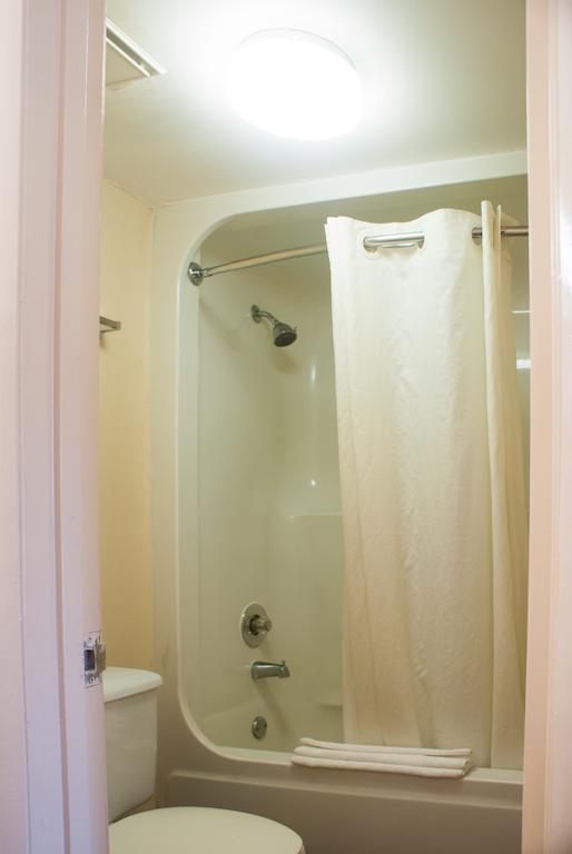 Queen Room with Two Queen Beds and Pool View - Non-Smoking