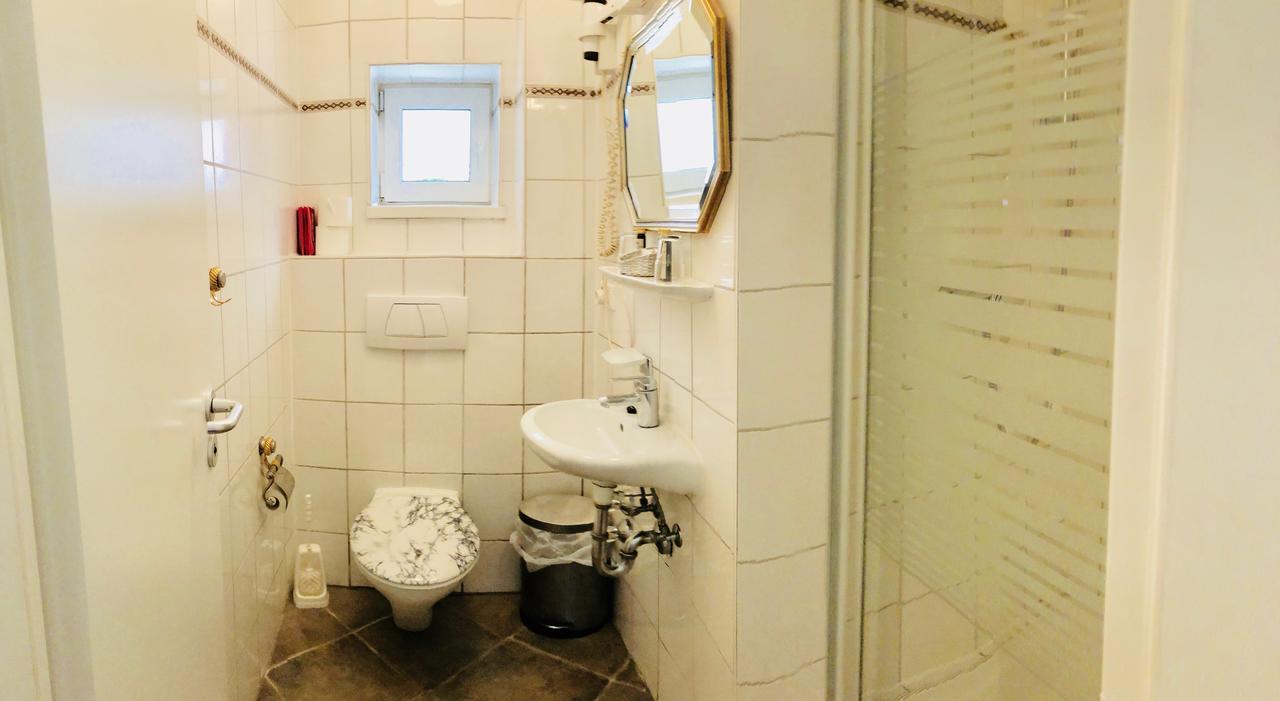 Dreibettzimmer mit Balkon