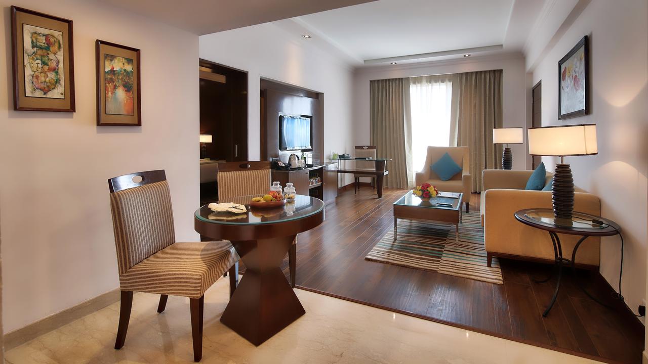 Suite (2 Way Airport Transfer,20% off on SPA, 4pcs of Laundry/room/nightI,INR 2000 F&B credit,Daily Fruit basket, 1 bottle of whiskey/wine as per availability, Dinner in Dragon If all meals room is booked, Sightseeing transport services and Lounge Ac