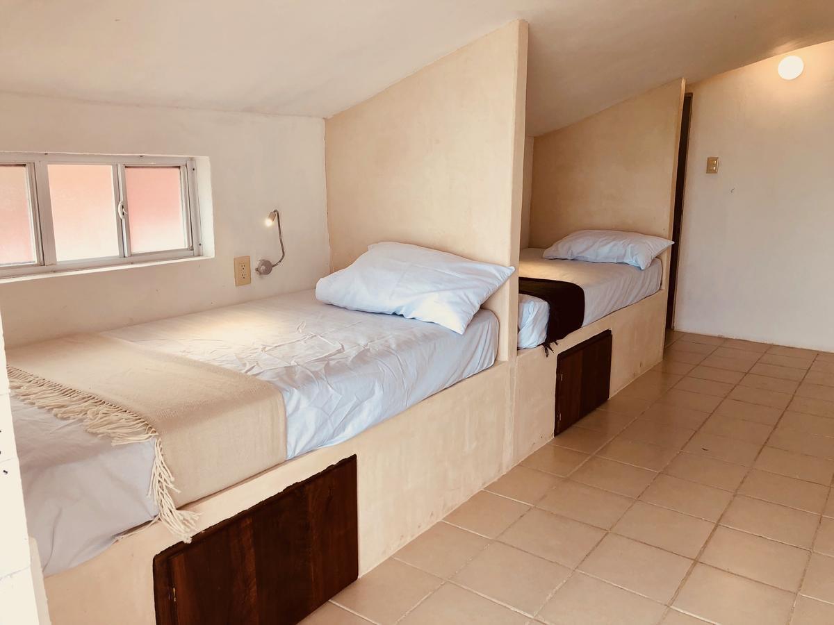 Chambre Quadruple avec Lits Simples - Vue sur Lac