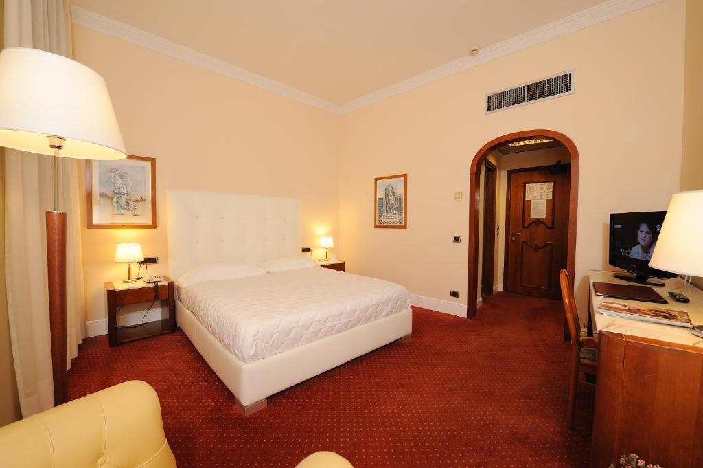 Quarto Clássico com Cama de Casal ou 2 de Solteiro