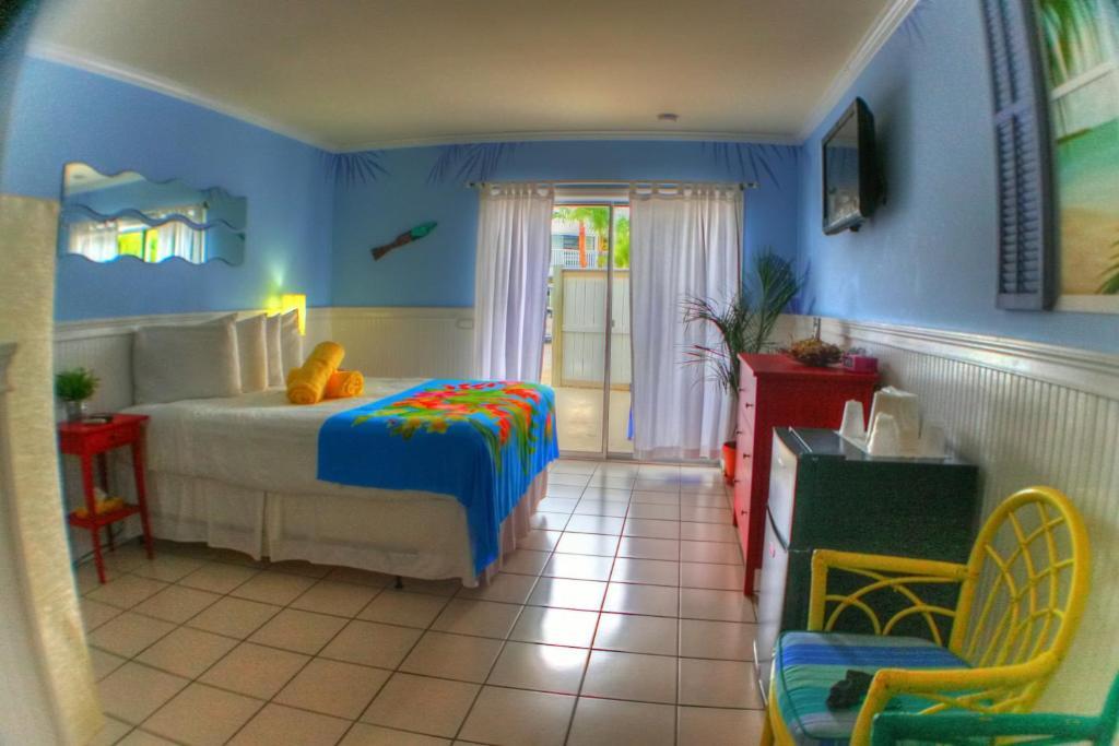 Deluxe Queen Room with Patio,63931348:JPEG