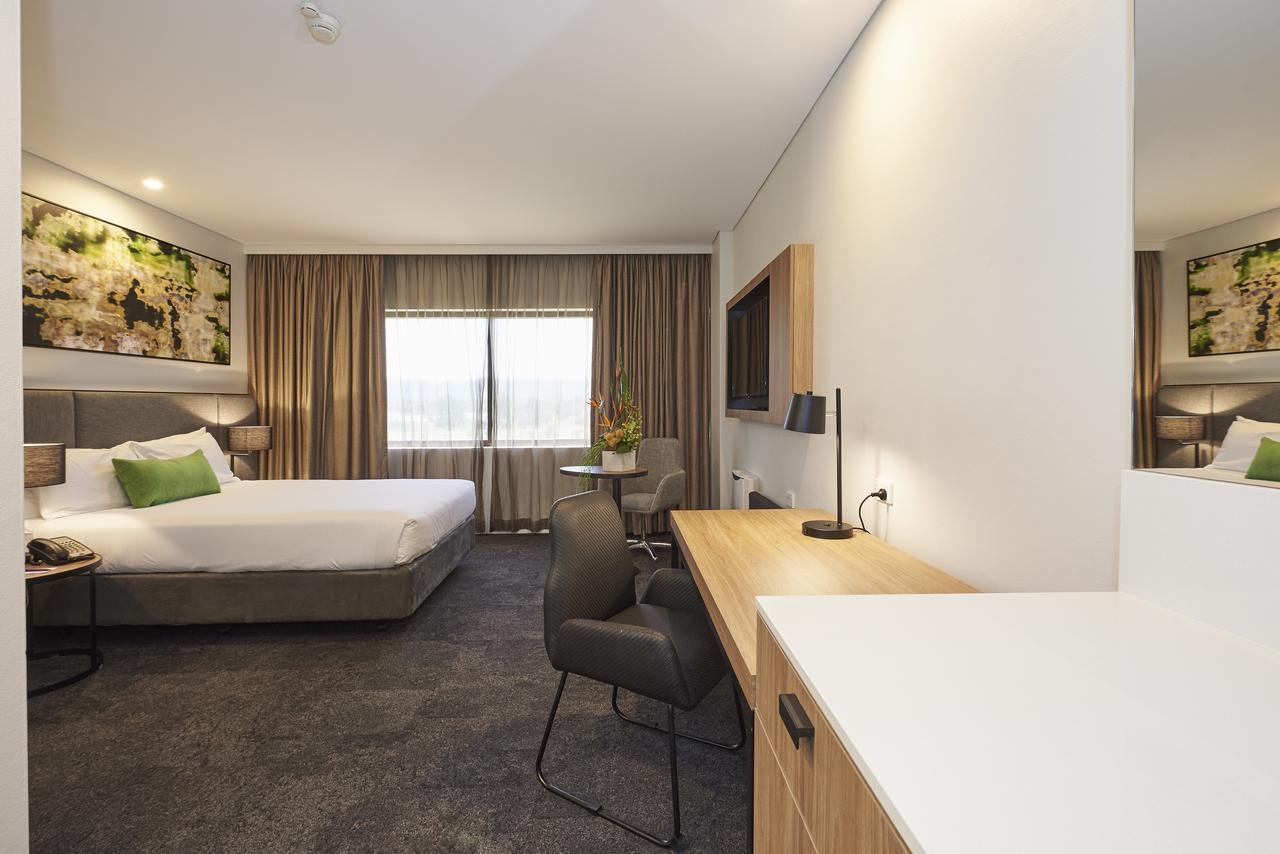 Standard Room with One Queen Bed and One Single Bed