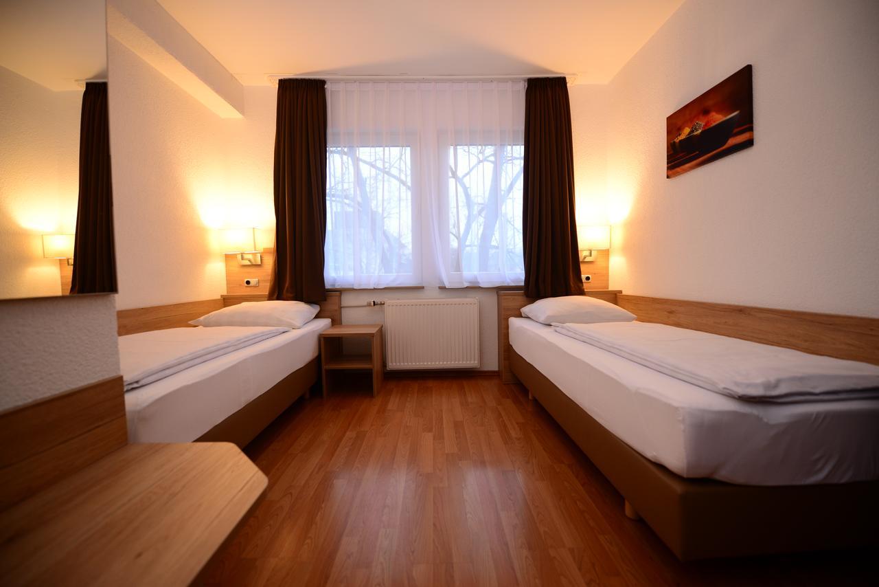 Tweepersoonskamer met 2 Aparte Bedden