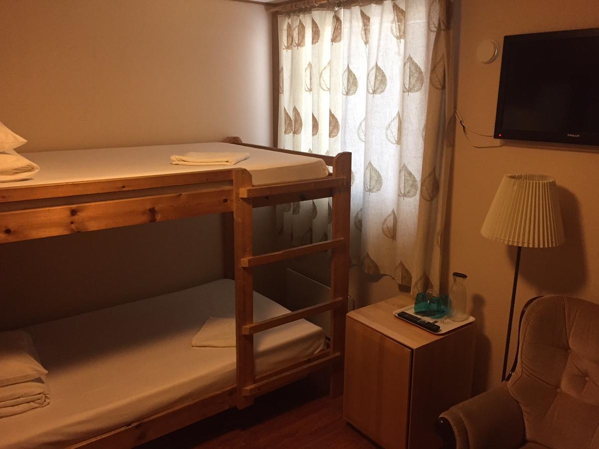 Quadruple Room with Shared Bathroom