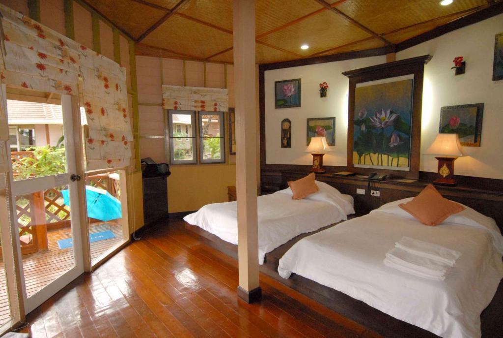 Chambre Double ou Lits Jumeaux Deluxe - Vue sur Piscine