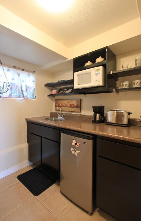 Habitación Doble con cama grande con cocina americana