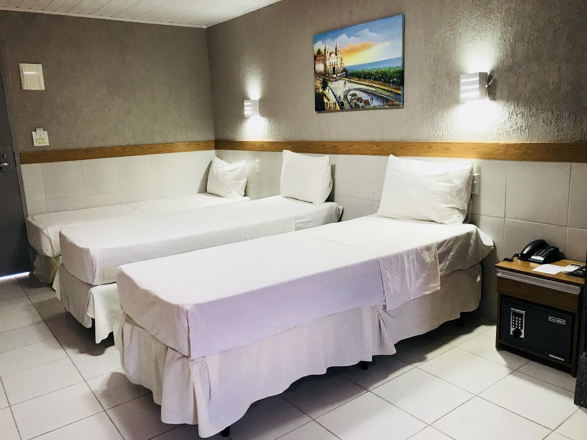 Quarto Triplo Superior (3 Camas de Solteiro)