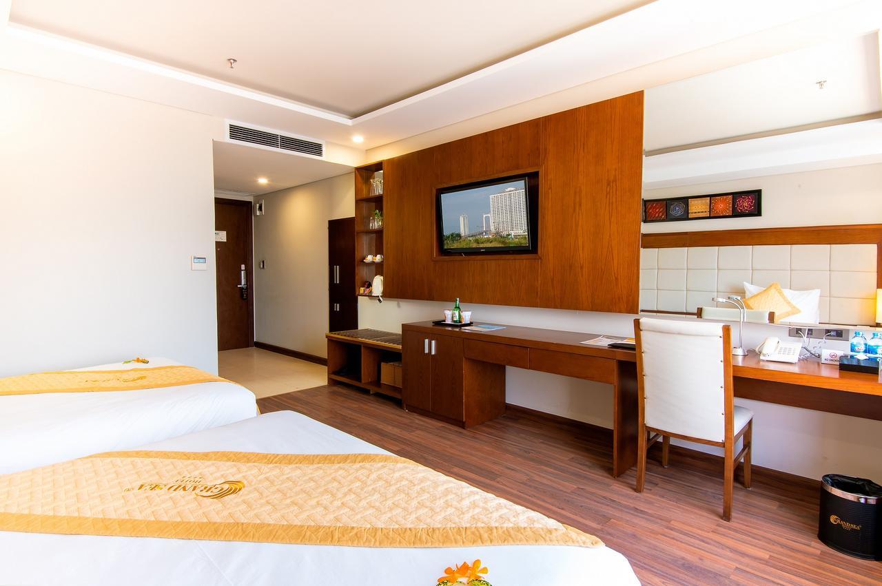 Family Deluxe Room with One Queen & One Double Bed and City View
