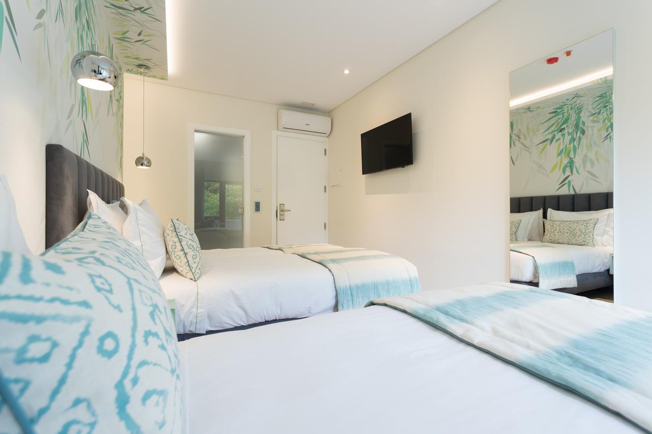 Quarto Twin com Casa de Banho Privativa
