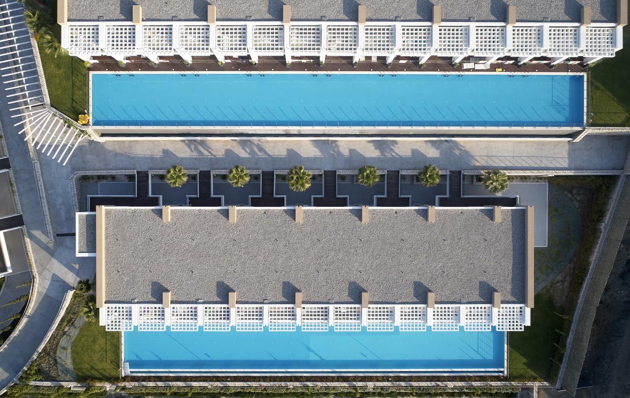 Junior Suite mit Gemeinschaftspool und Meerblick