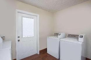 Queen Room with One Queen and One Double Bed, Mobility Access/1st Floor and Roll-In Shower, Non-Smoking