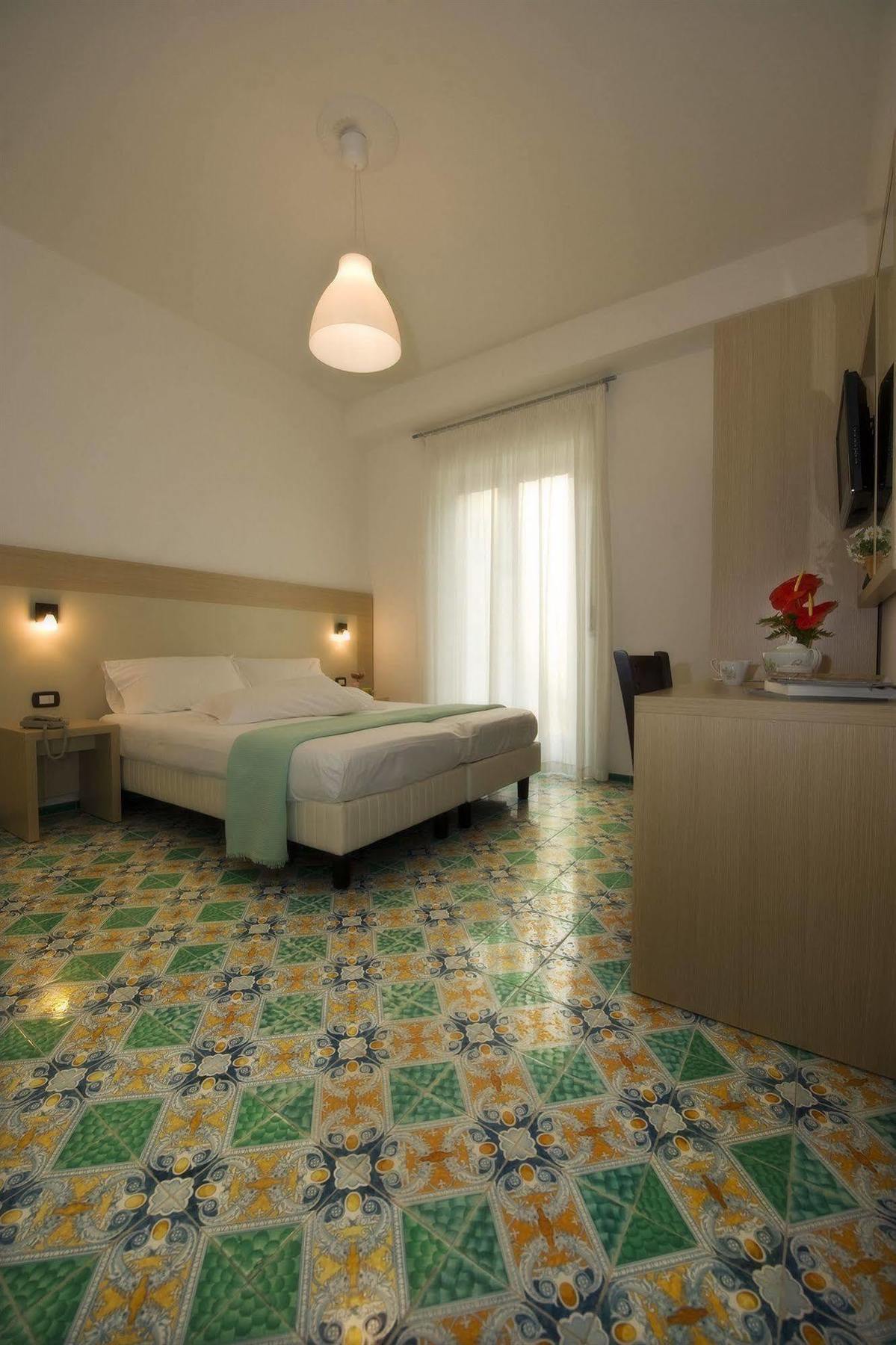 Quadruple Room with Balcony