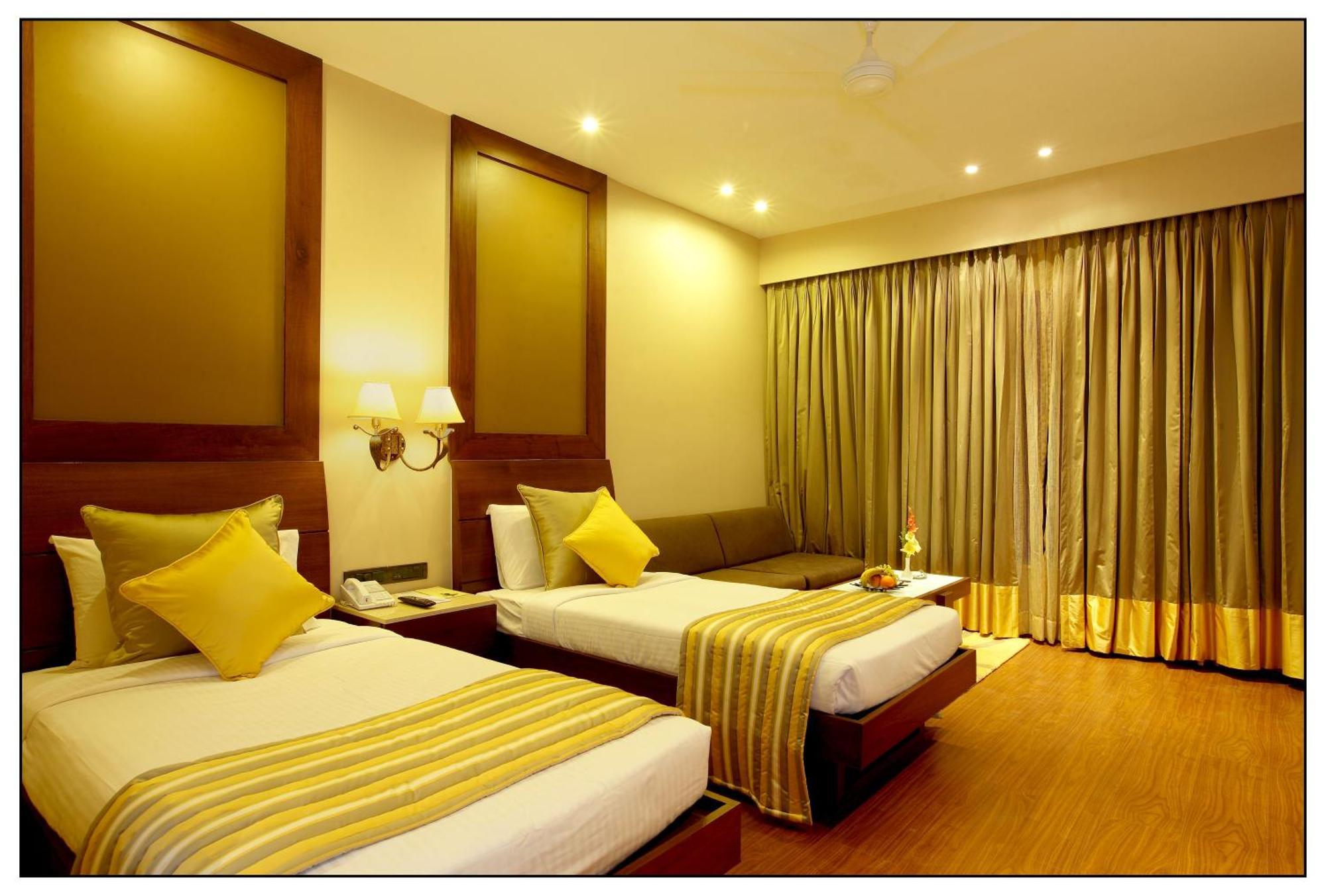 Superior Double Room with Pool View with Complimentary shuttle transfers to and from Sai Baba Temple (round trip). Advance reservation required.
