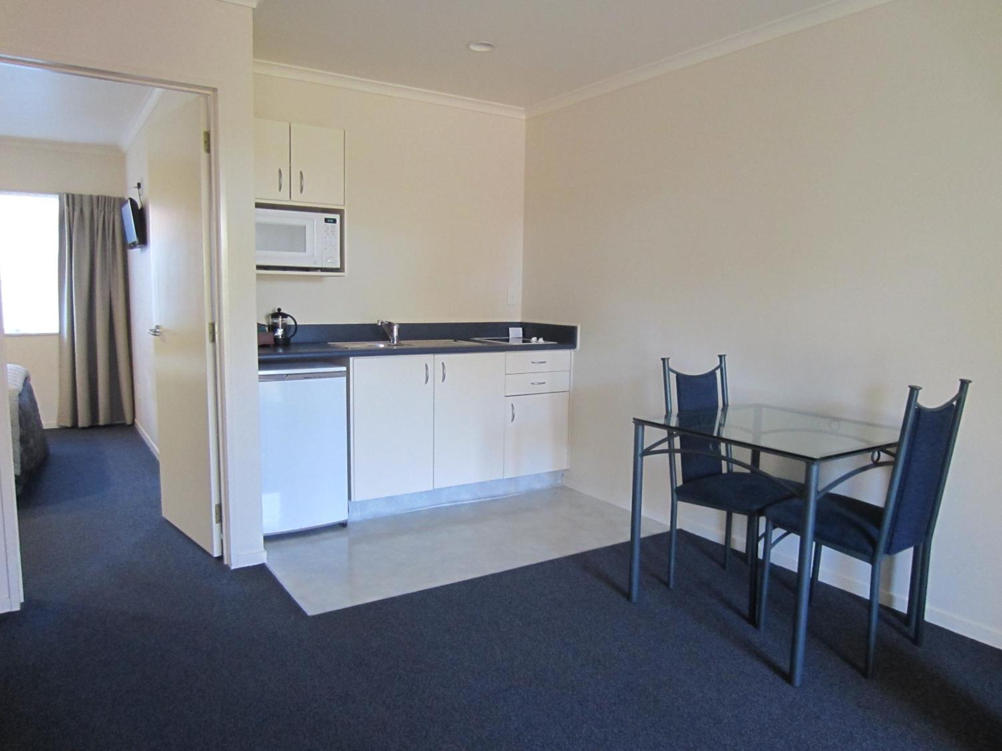 Superior One-Bedroom Suite with Spa Bath with Air Conditioning
