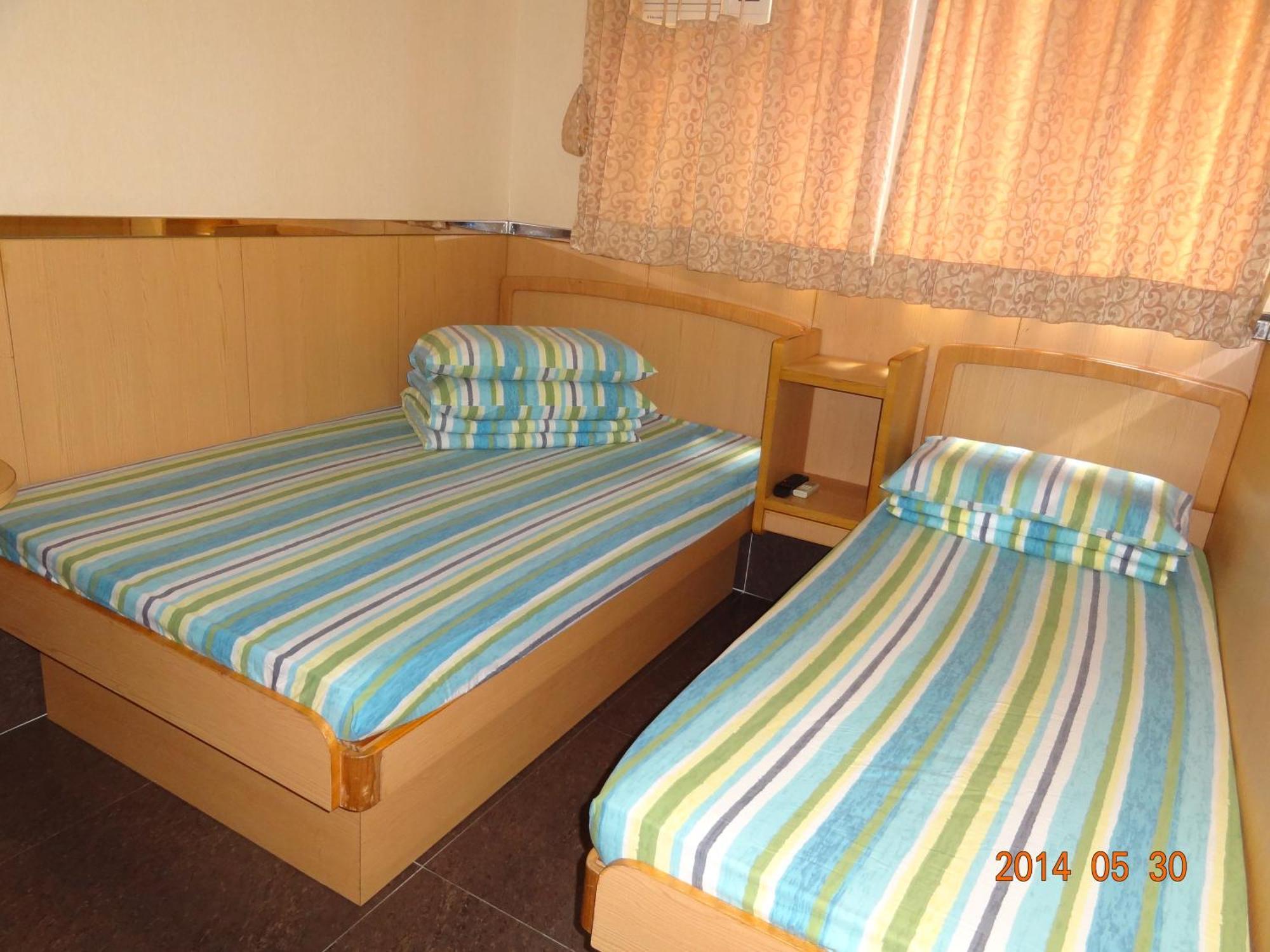 Kamar Triple dengan Pemandangan Kota