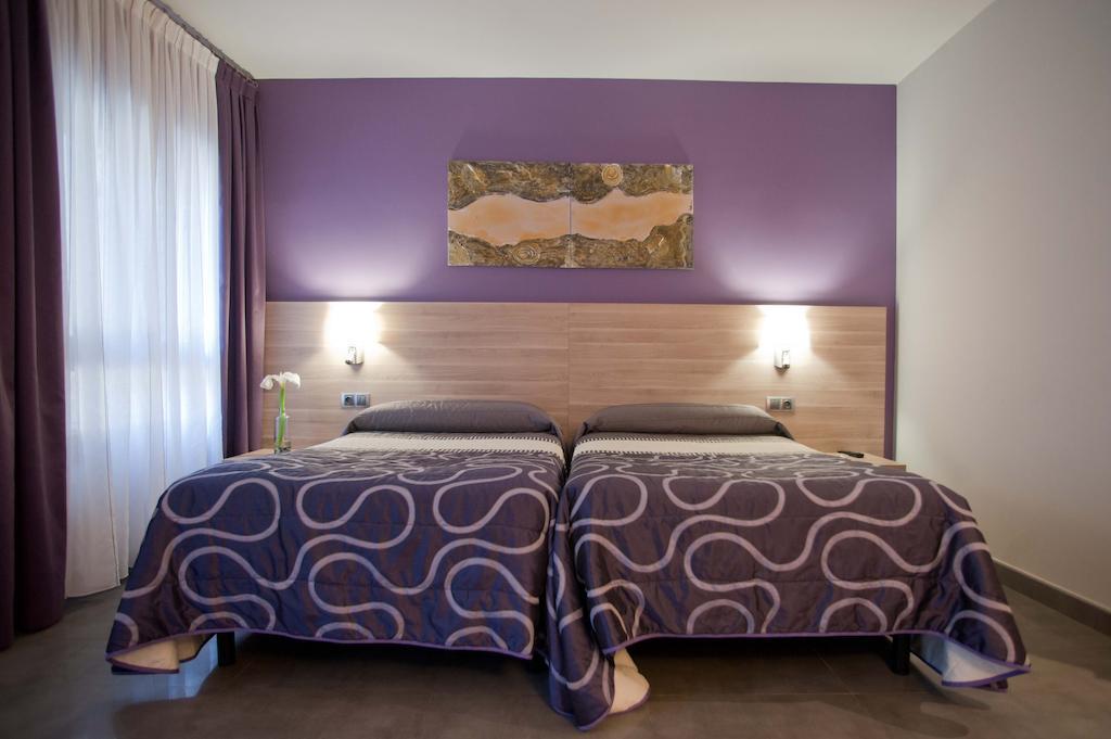 Habitación Doble Confort con cama supletoria - 1 o 2 camas