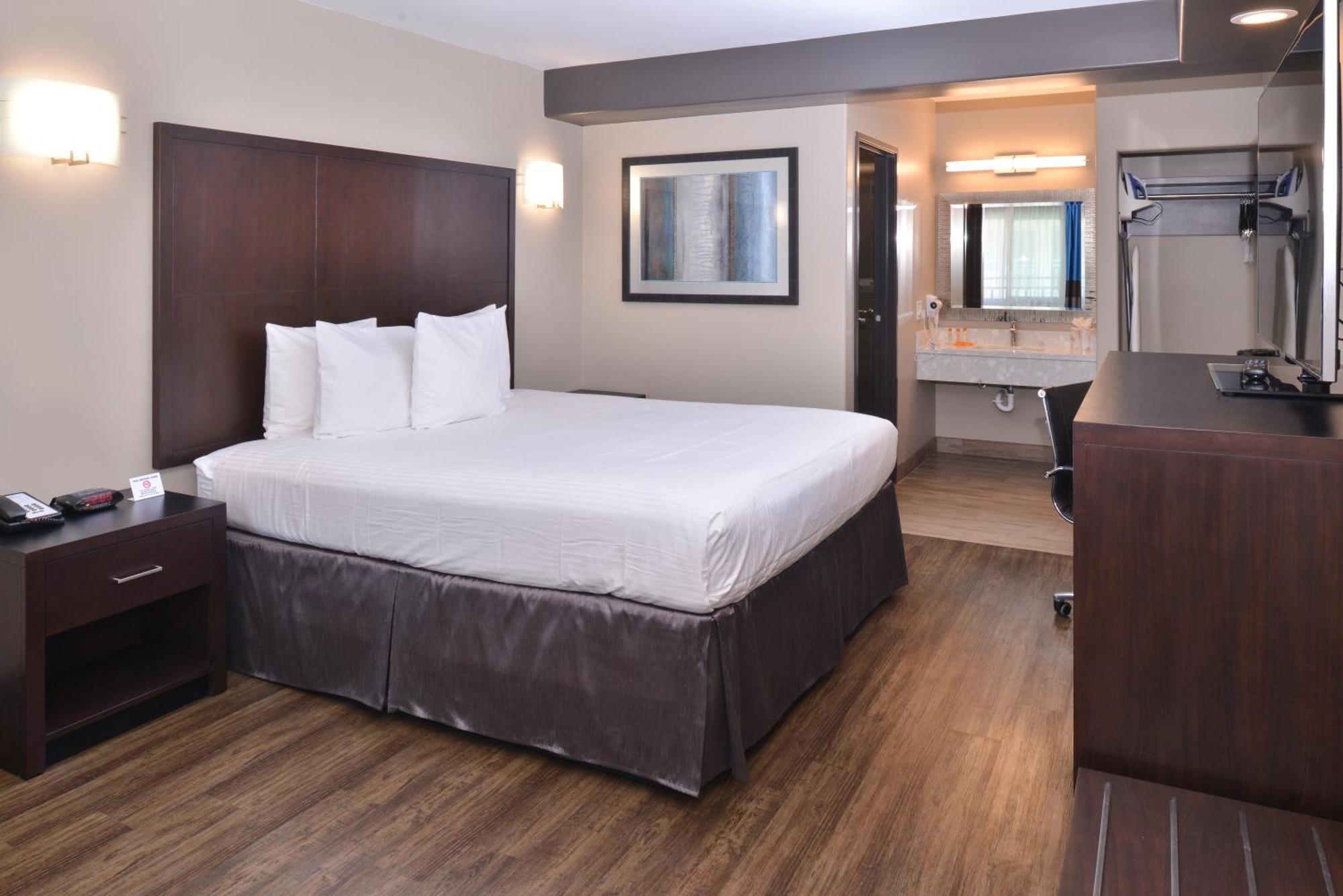 Chambre Lit King-Size Deluxe - Non-Fumeurs