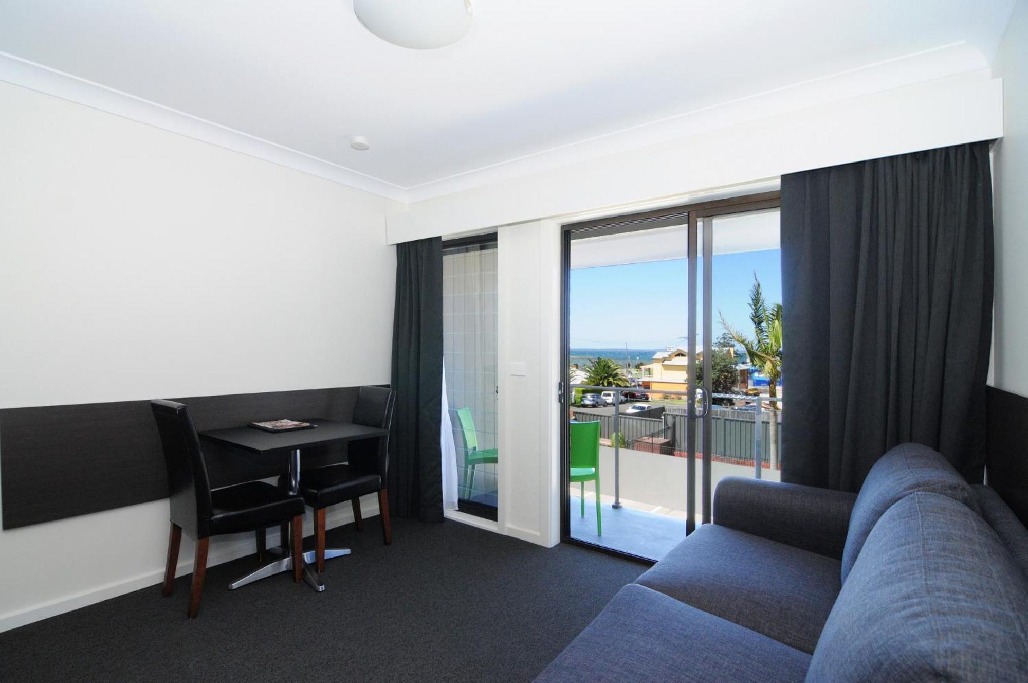 Queen Room with Balcony and Ocean View - Upper Level