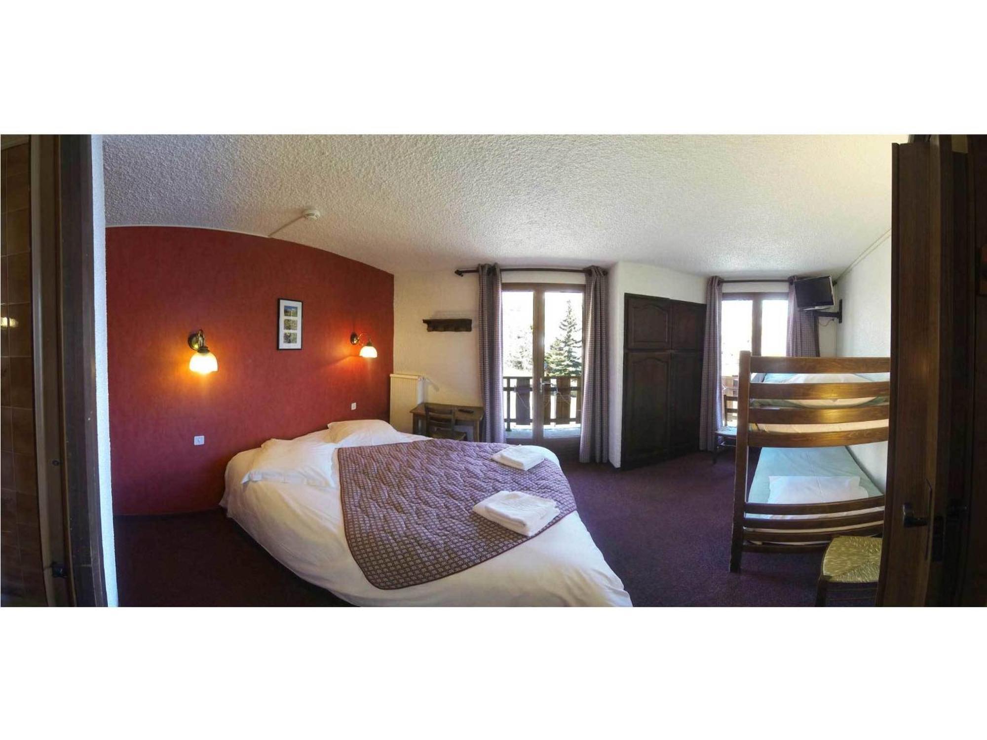 Chambre Quadruple avec Balcon