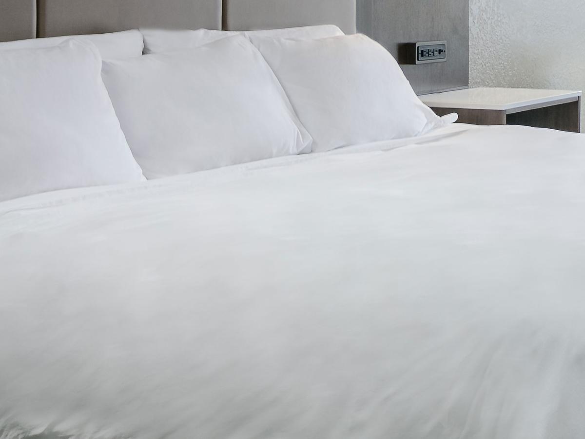 Chambre Lit King-Size Deluxe - Non-Fumeurs