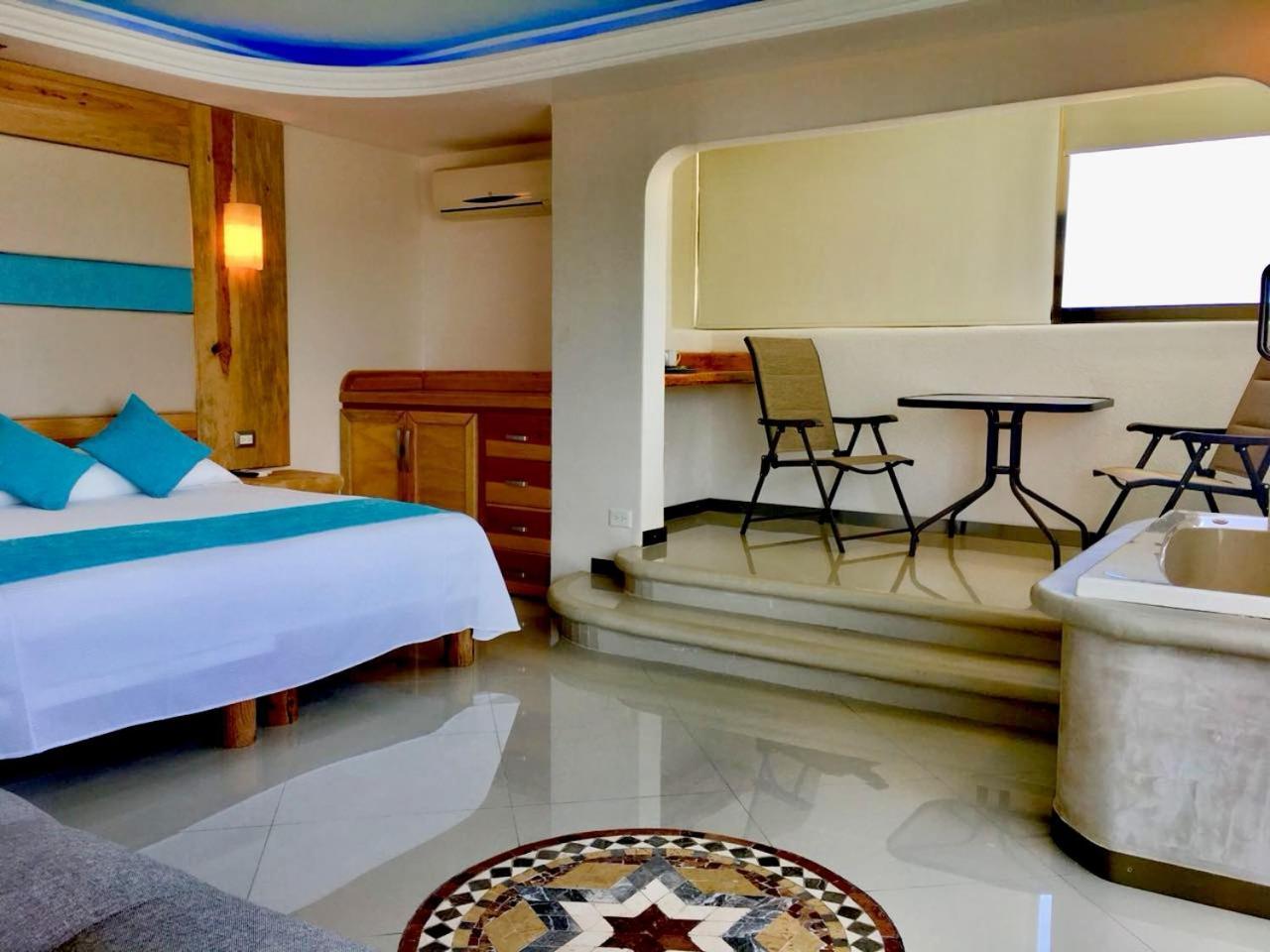 Suite con bañera de hidromasaje - Cama extragrande