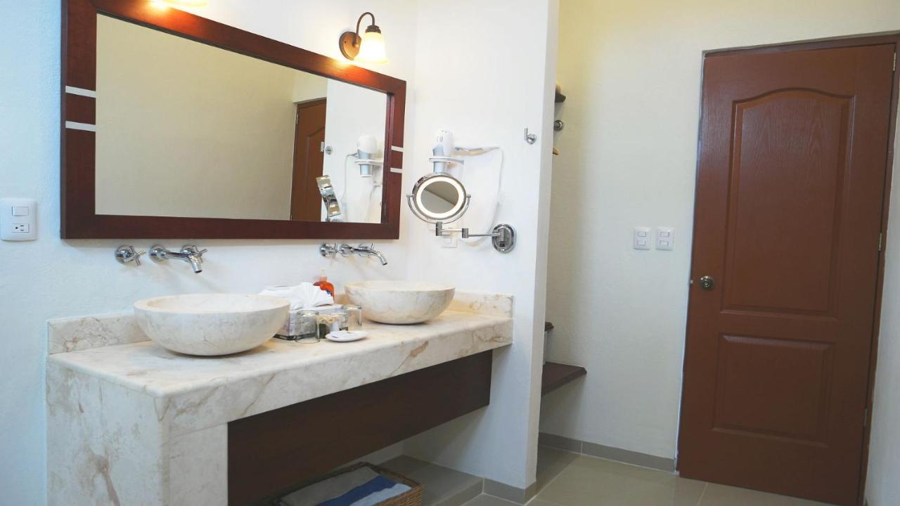 King Suite with Private Terrace and Pool View.