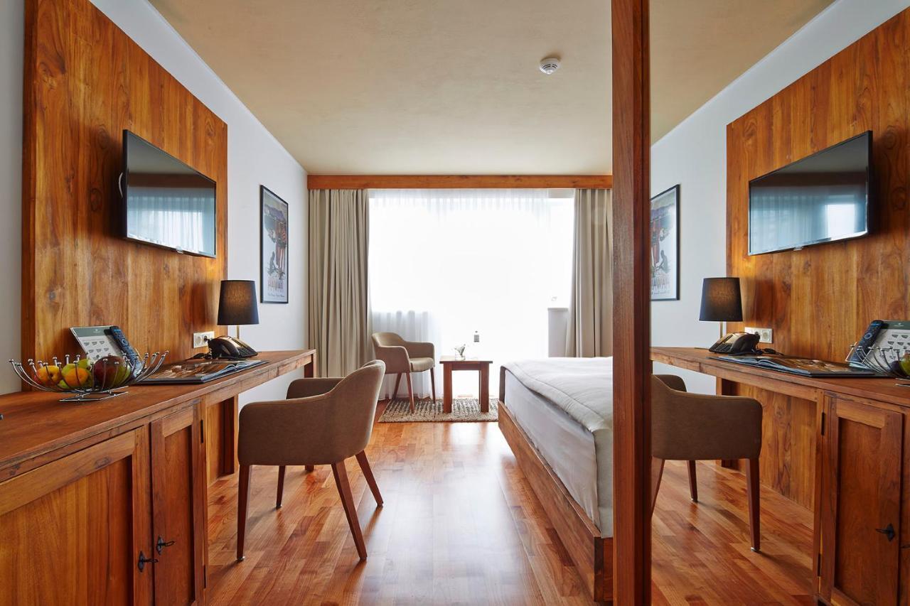 Habitación Deluxe con balcón y vistas al jardín