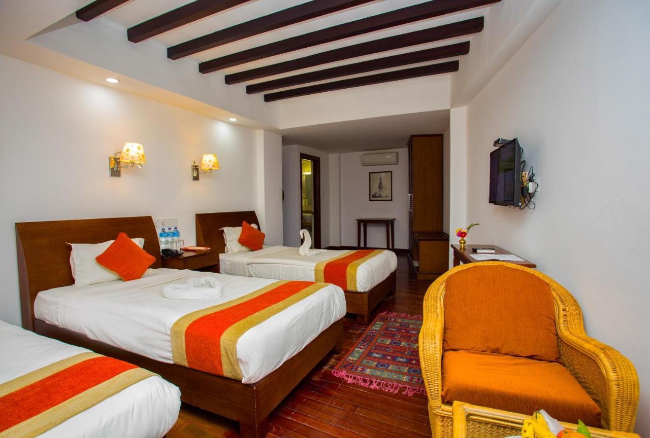 Deluxe Triple Room Garden View