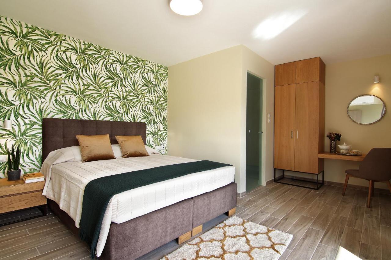 King Suite with Balcony & Side Sea View