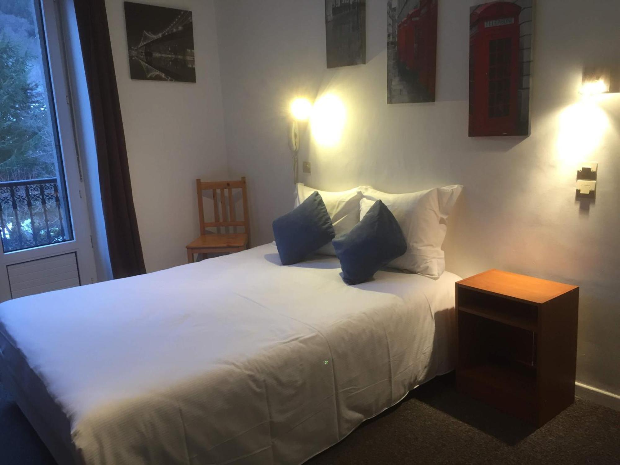 Chambre Quadruple (2 Adultes + 2 Enfants)