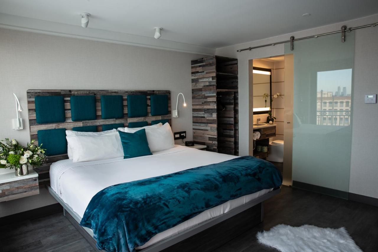 Habitación Deluxe Signature Collection con terraza - Cama extragrande