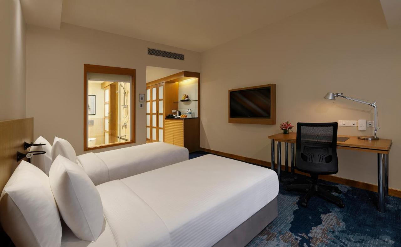 Superior 2 Single Beds Poolside