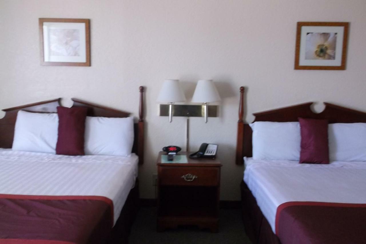 Room with One Queen and One Double Bed - Mobility Access/Non-Smoking