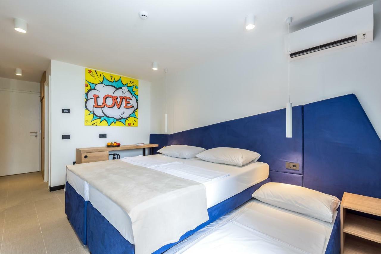 Double Room with Extra Bed, Sea Side View and Balcony