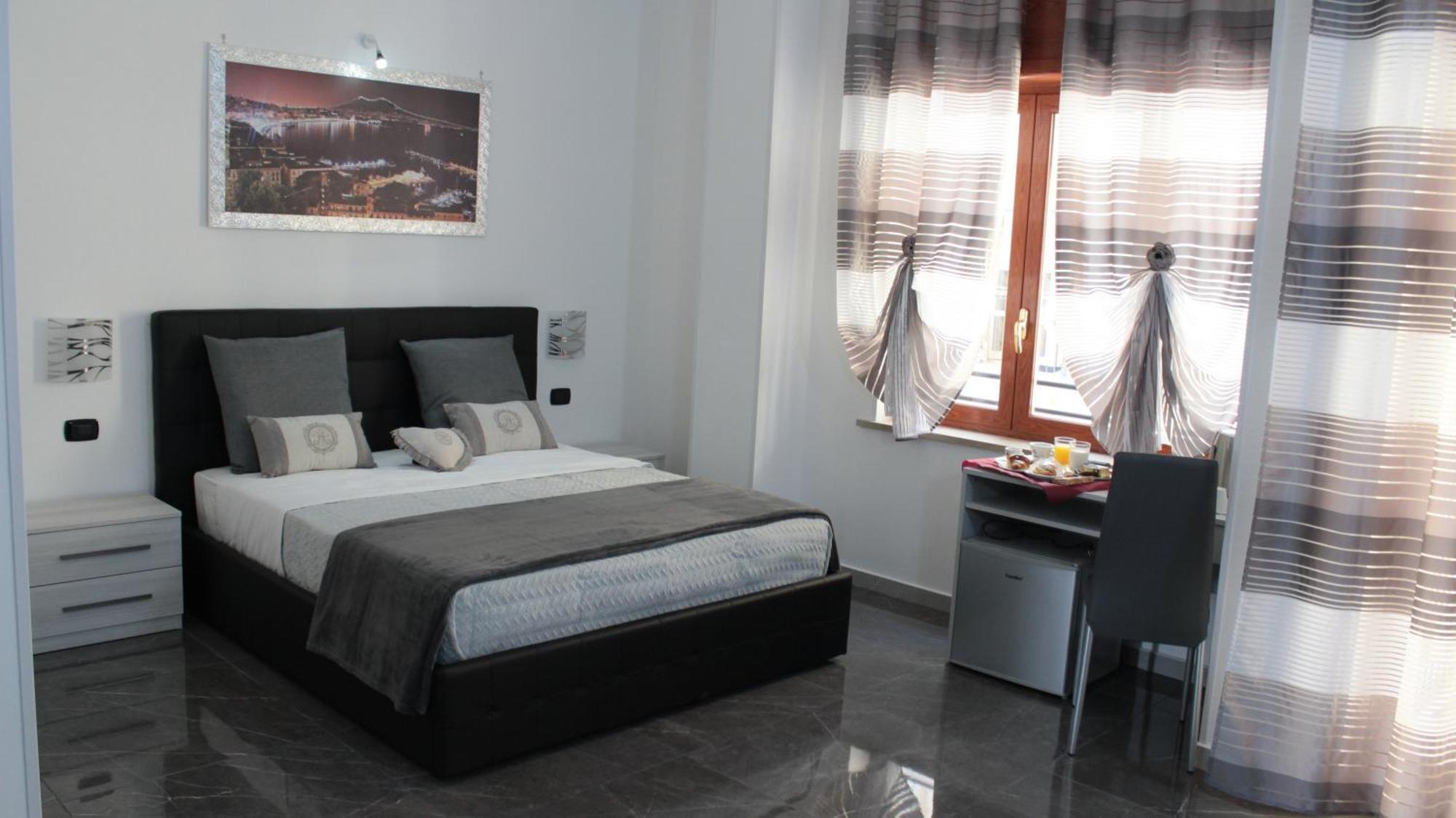 Chambre Quadruple avec Salle de Bains Privative