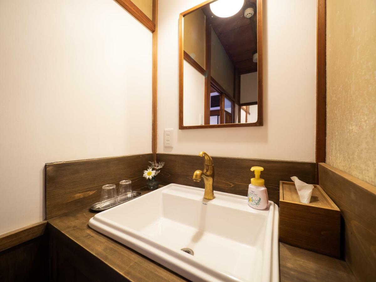 Japanese-Style Family Room with Shared Bathroom