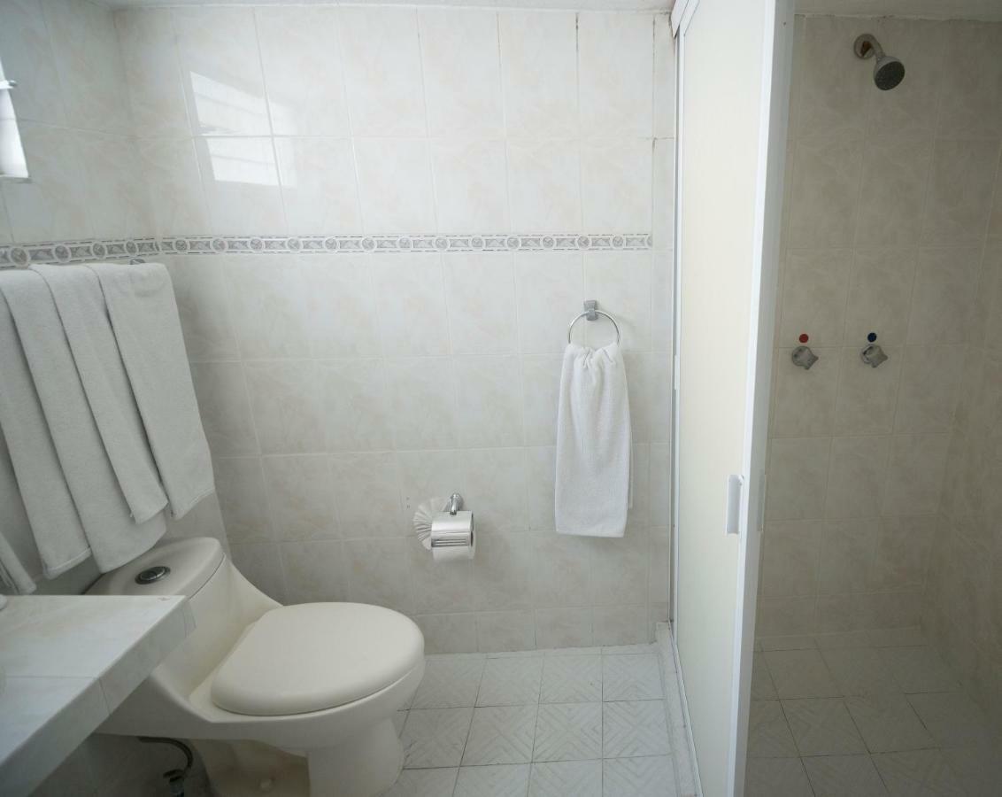 Habitación con 2 camas dobles