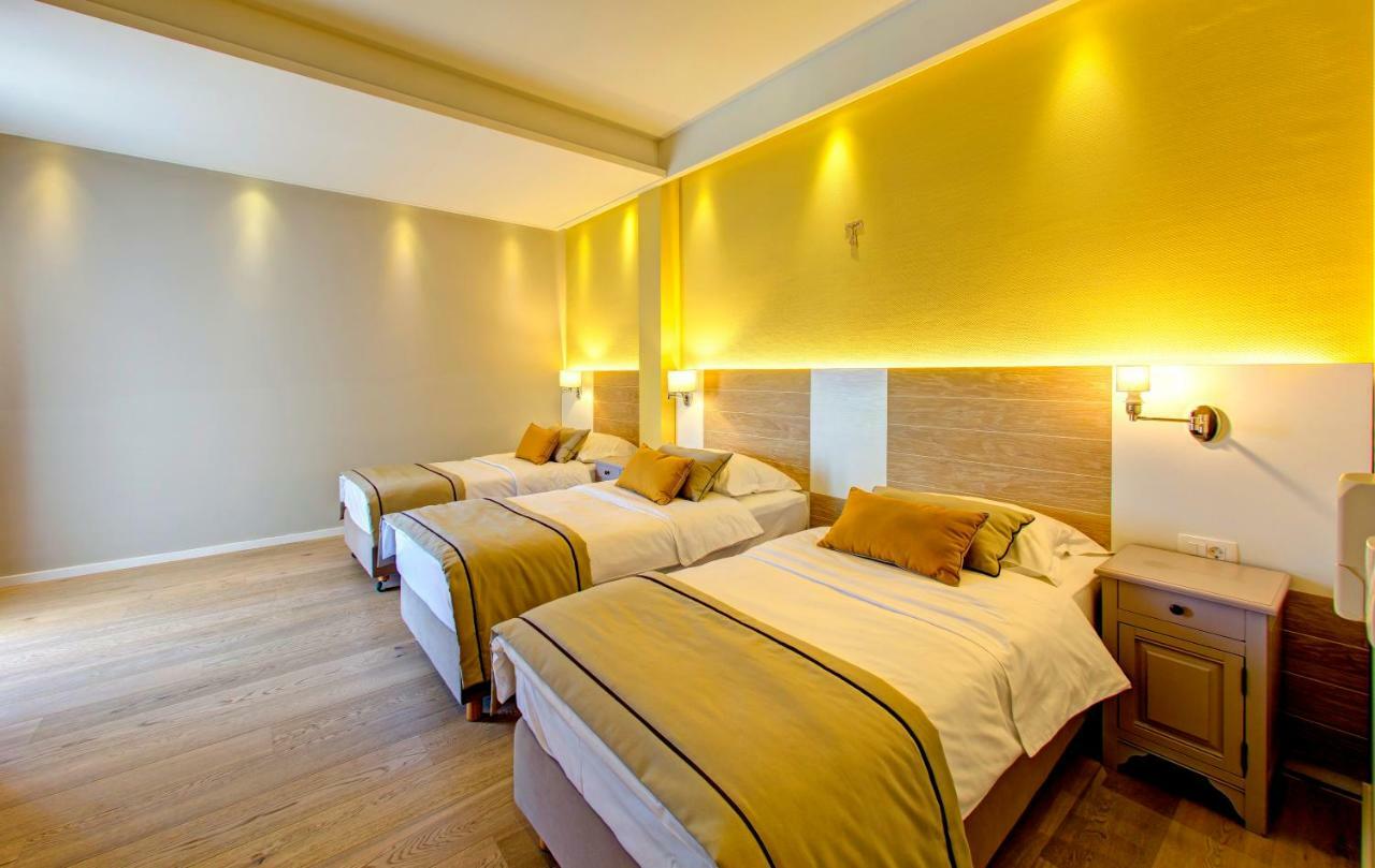 Deluxe Dreibettzimmer mit Balkon