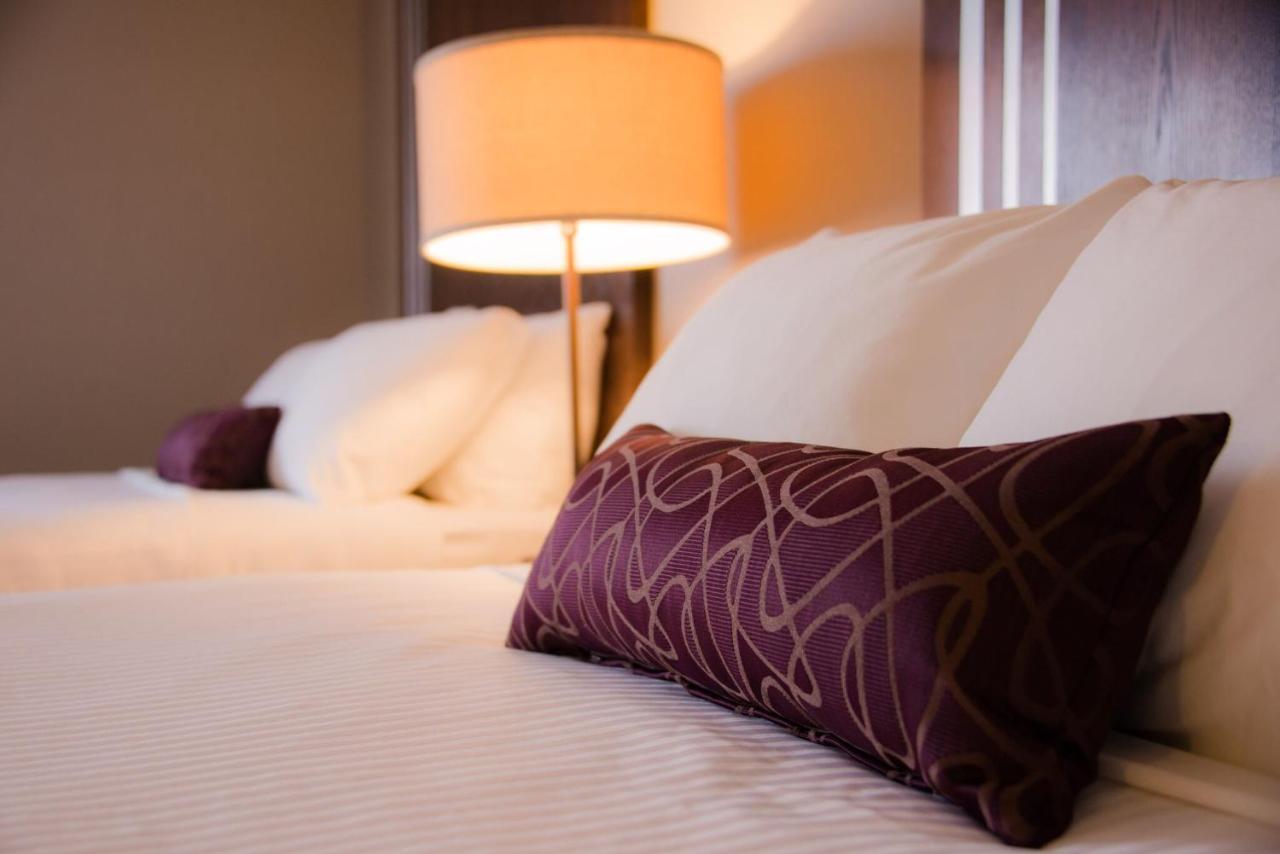 Queen Room with Two Queen Beds and Sofa Bed