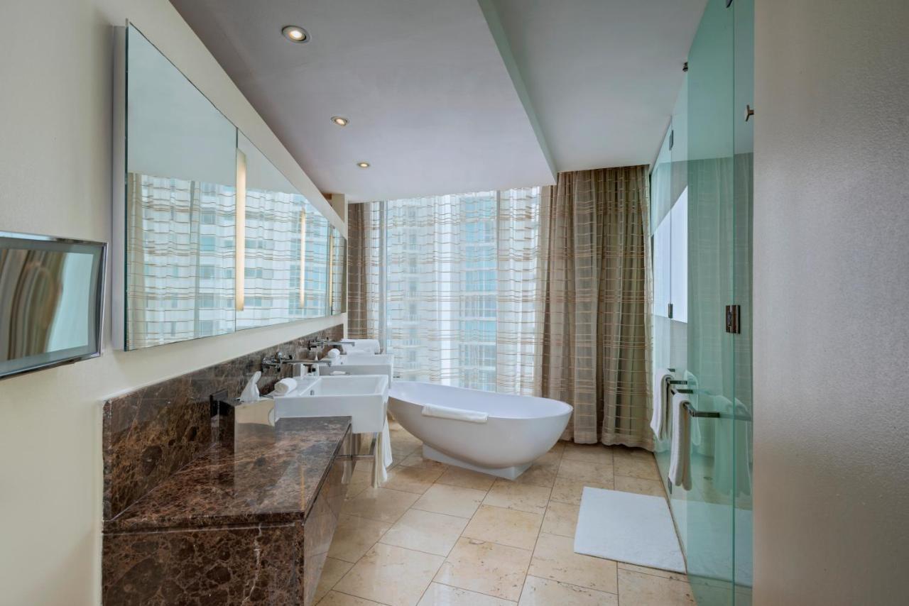 Executive suite king bed balcony partial ocean view,1772915433:JPEG