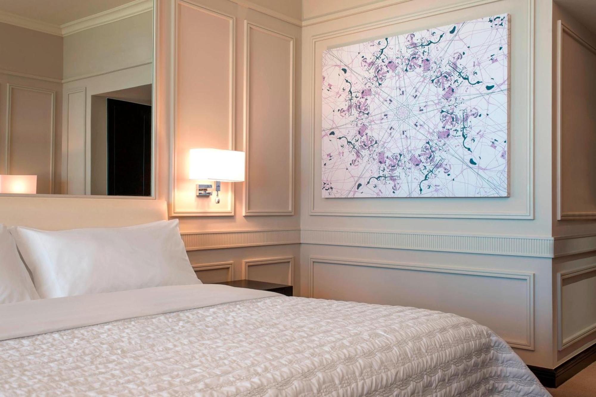 Deluxe met 1 Kingsize Bed en 1 Eenpersoonsbed - Balkon met Uitzicht op Zee