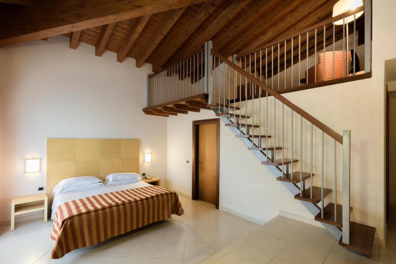 Suite Familiale Junior avec Accès au Spa - Vue sur Jardin