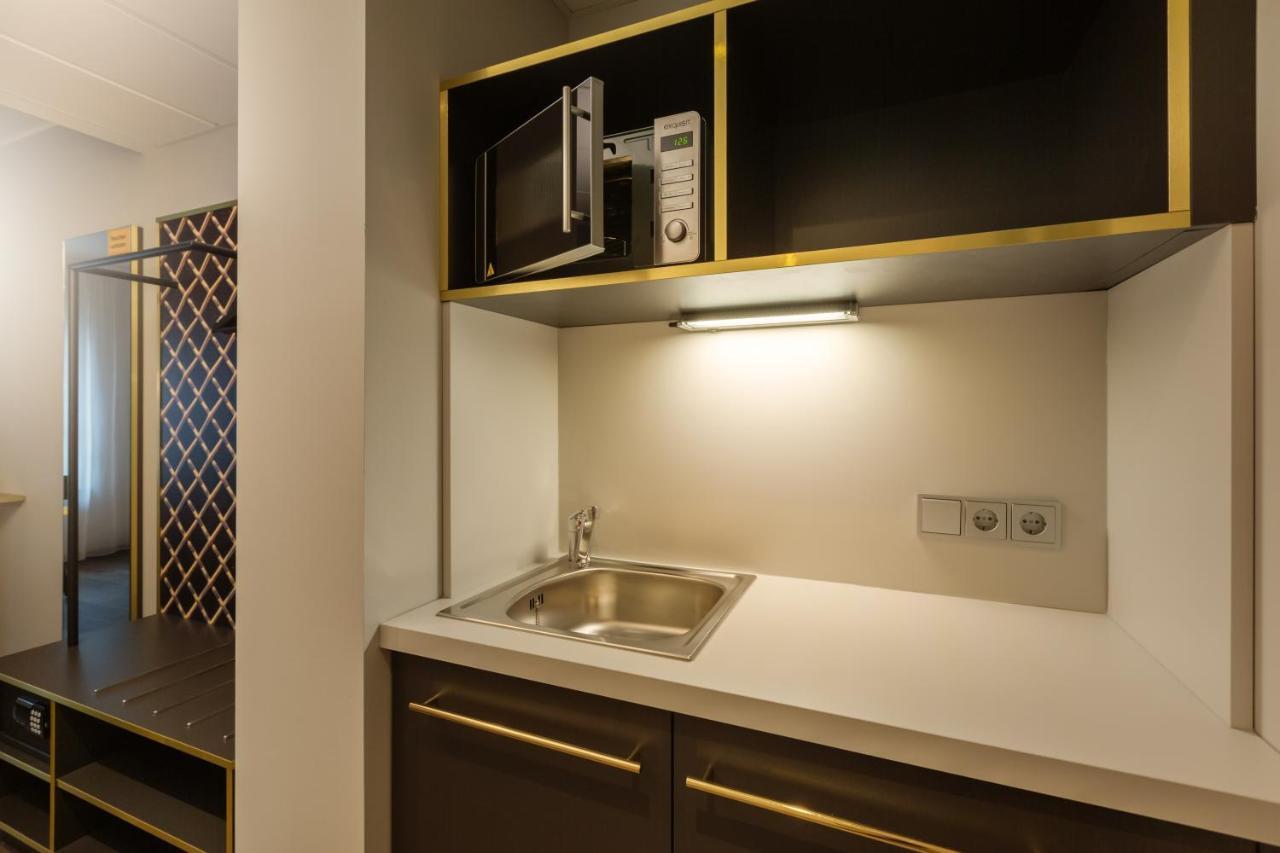 Premium Kamer met Queensize Bed en Kitchenette