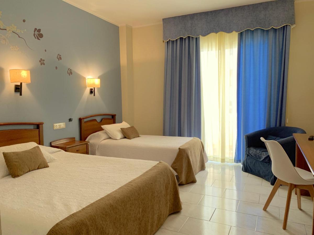 Habitación Triple con balcón