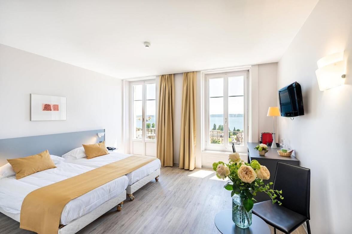 Zweibettzimmer mit Balkon und Seeblick