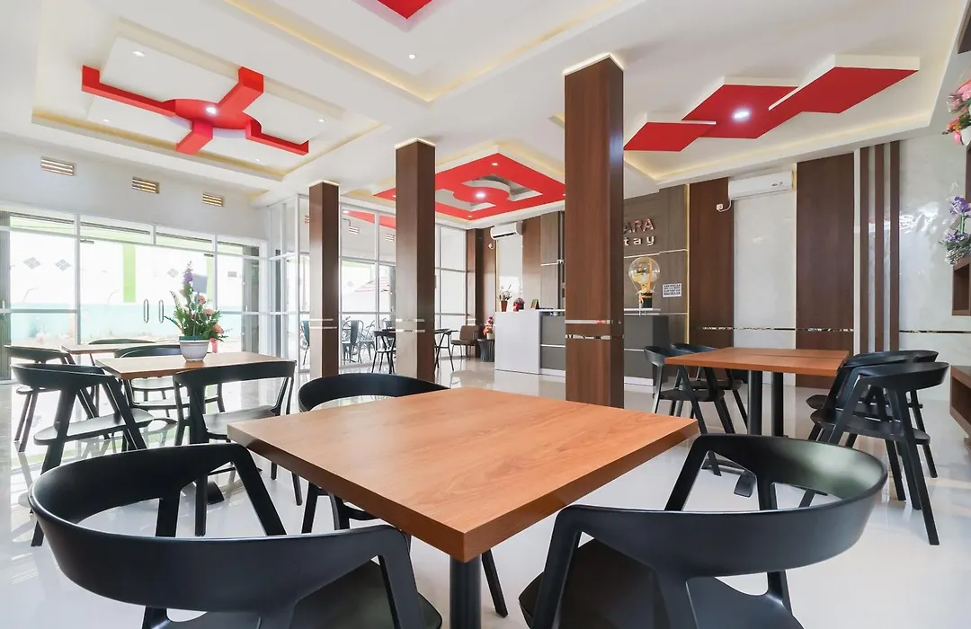 Reddoorz Plus At Grand Tara Homestay Palembang-1